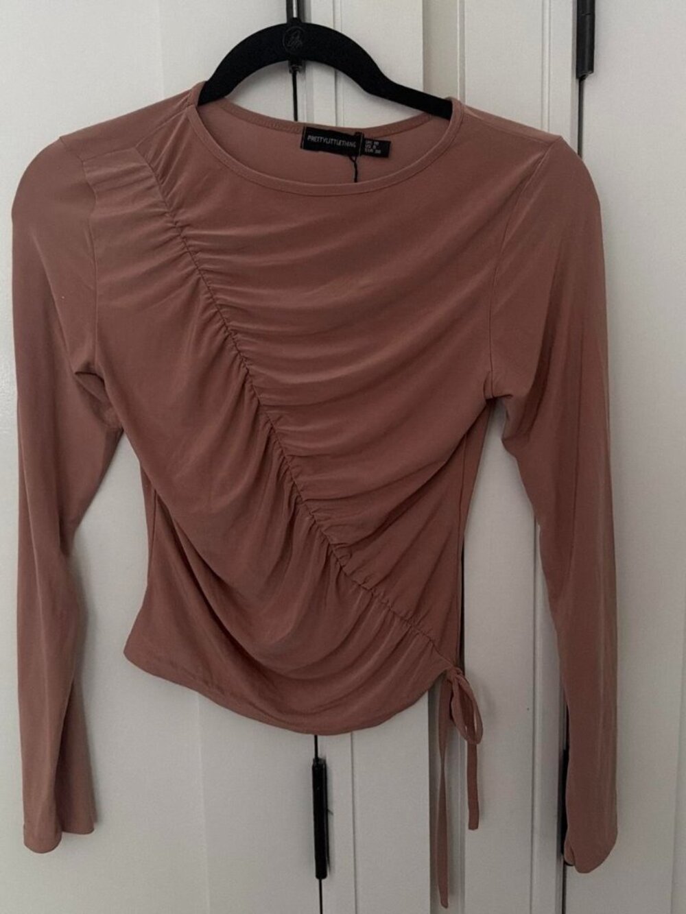 Dusty pink long sleeve top with ruched and tie detail